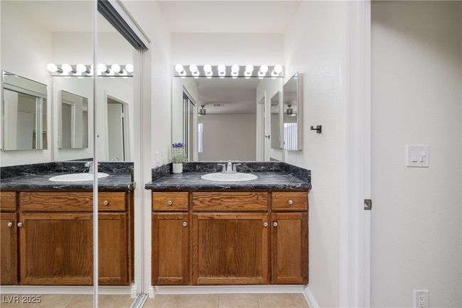Full bathroom with vanity and tile patterned floors | Image 17