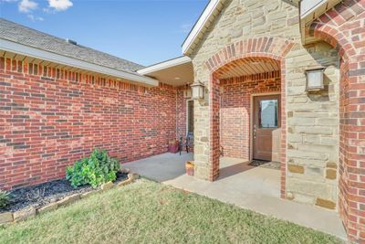 Stone and covered entrance. | Image 3