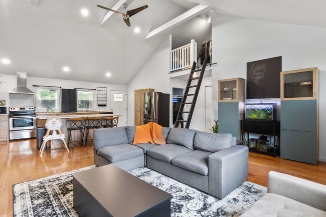 Looking toward the 2 bedrooms, bathroom, and the loft off the living room. | Image 15