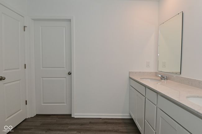 The primary bath has a private water closet ! | Image 57