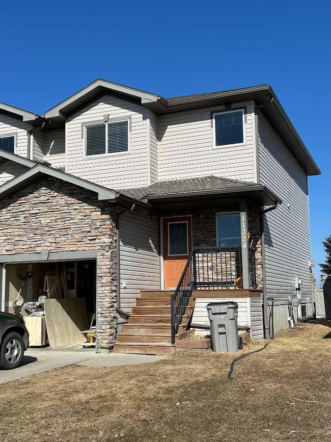 11224 71 Avenue, Home with 3 bedrooms, 1 bathrooms and 2 parking in Grande Prairie AB | Image 1