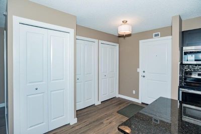 6407 - 403 Mackenzie Way Sw, Condo with 2 bedrooms, 2 bathrooms and 2 parking in Airdrie AB | Image 3