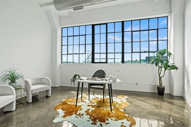 Office space featuring concrete flooring | Image 22