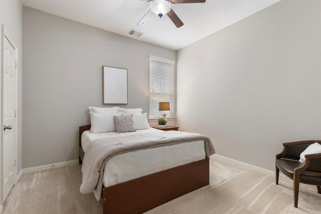 Split floor plan. This is the 1st floor secondary bedroom. Just outside bedroom is a full bath. | Image 23