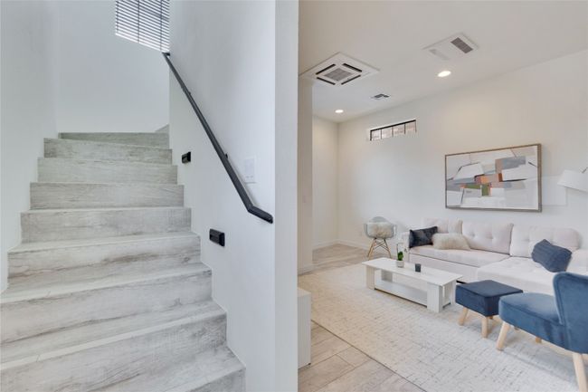 Stairs featuring recessed lighting and wood finished floors | Image 17