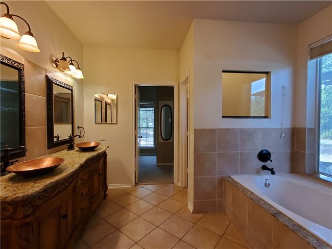 10400 W Cave Loop, House other with 4 bedrooms, 2 bathrooms and 5 parking in Dripping Springs TX | Image 20