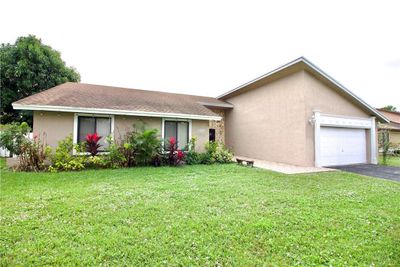 8310 Nw 54th Ct, House other with 3 bedrooms, 2 bathrooms and null parking in Lauderhill FL | Image 1