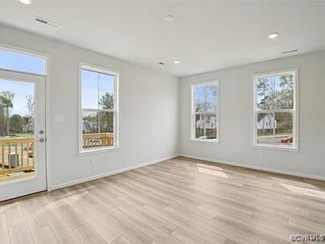 Spare room with light wood-type flooring and recessed lighting | Image 12