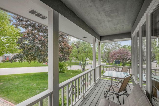 Enjoy morning coffee on the east-facing front porch | Image 24