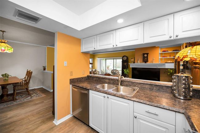 Look out to the living room while cooking. | Image 36