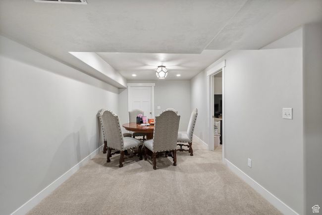 Dining room with carpet flooring and recessed lighting | Image 23