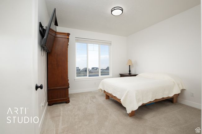 View of carpeted bedroom | Image 26