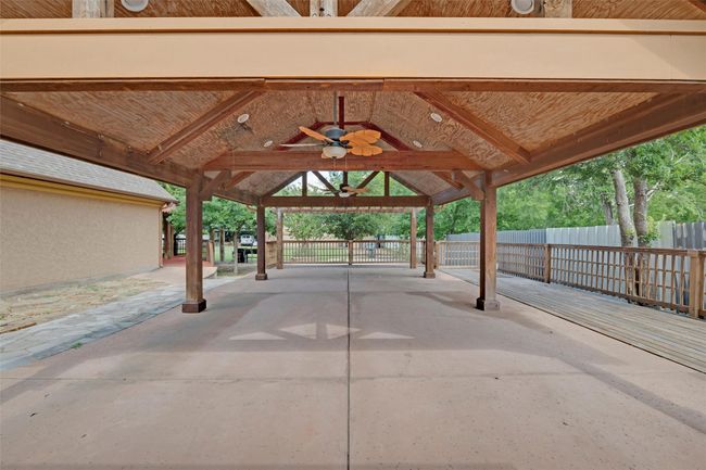 View of patio / terrace with ceiling fan | Image 29
