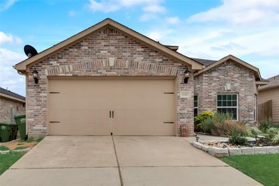 View of front of home with a garage | Image 1