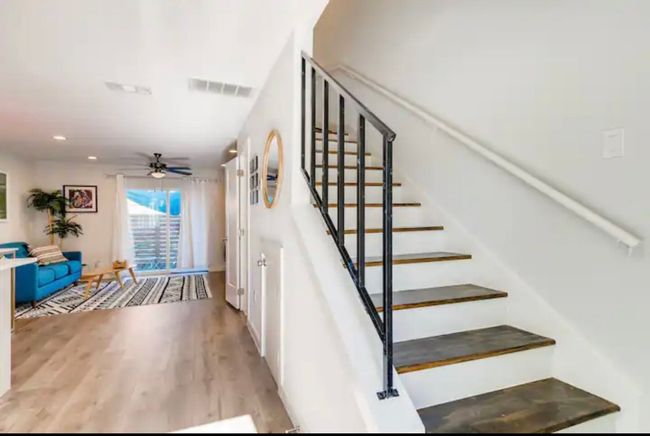 Staircase featuring wood finished floors, ceiling fan, and recessed lighting | Image 12