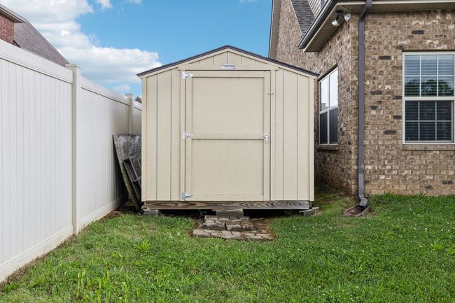 A handy storage shed provides extra space for tools, lawn equipment, or seasonal items.1107 Sycamore Leaf Way Murfreesboro, TN 37129 | Image 39