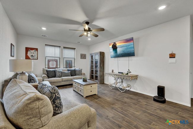 Living space and beautiful flooring. | Image 9