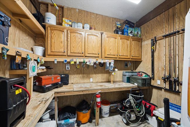 Enjoy a cool, air-conditioned workshop downstairs. | Image 27