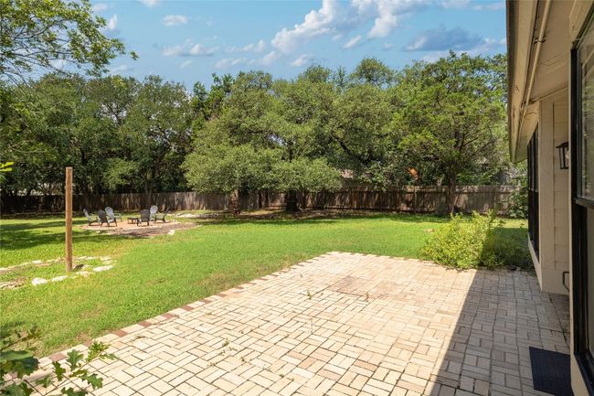 Patio beautifully presents the rest of the backyard. | Image 27