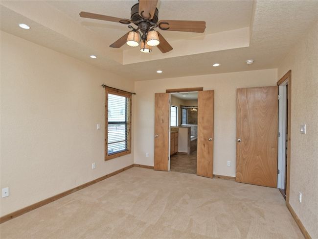 Primary Suite has a closet plus additional closet space located in the adjoining Primary Bath. | Image 14