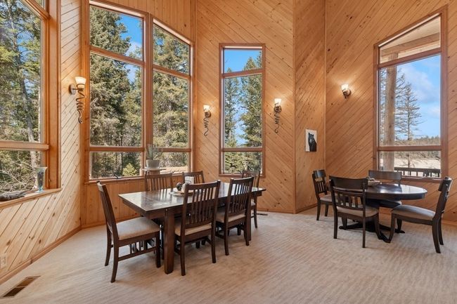 great room featuring large windows to let in the light | Image 42