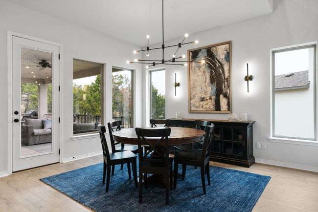 Enjoy direct access to the expansive back patio space from the dining area. | Image 16