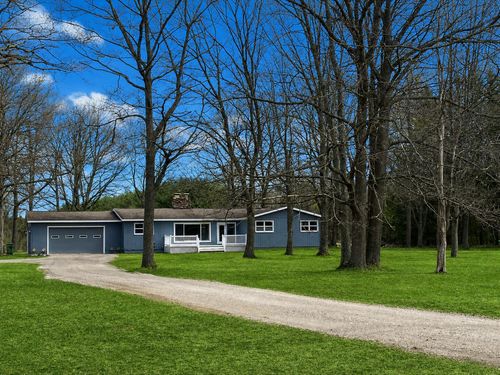 6561 E 34 1/2 Rd, Cadillac, MI, 49601-9656 | Card Image