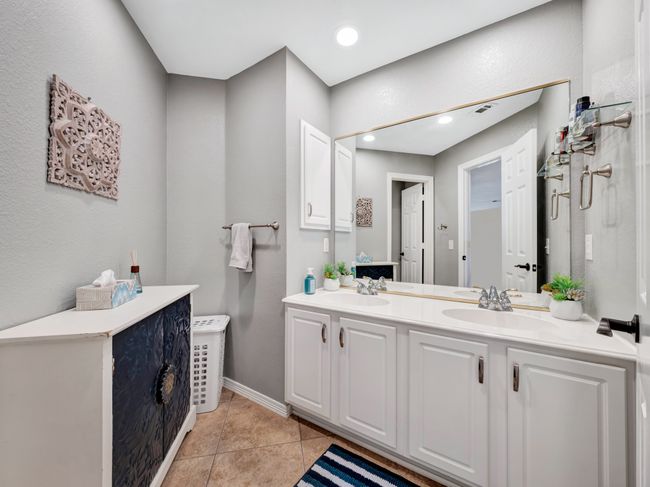 Upstairs full bathroom with tile flooring, a double sink vanity, and recessed lighting | Image 36