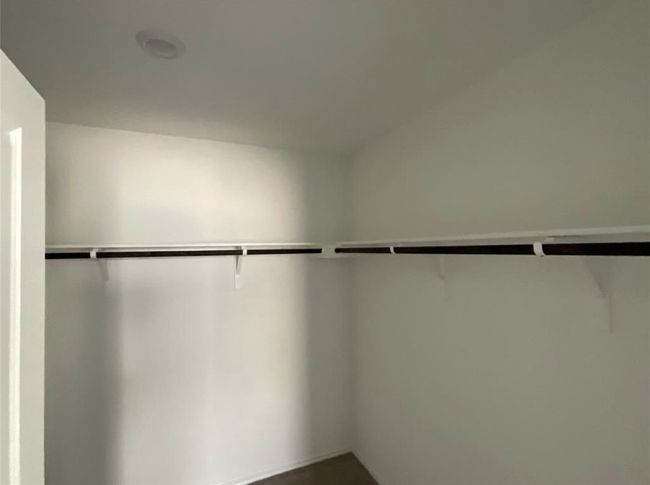 View of walk in closet | Image 24