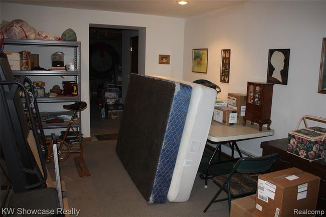 Finished area of basement currently used for storage, was used as a non-conforming bedroom at one time. Would make a great game room too. | Image 51