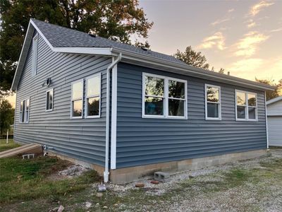 View of property exterior at dusk | Image 1