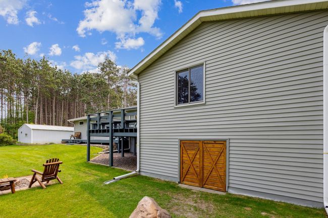 Tuck under storage area is big enough for all the yard equipment and off season storage. | Image 37
