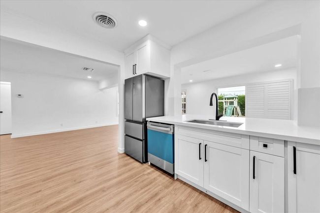 Newly Renovated with White Shaker Cabinets, Quartz Countertops & Stainless Steel Appliances | Image 8