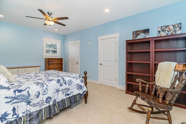 Carpeted bedroom featuring recessed lighting, a ceiling fan, and baseboards | Image 28
