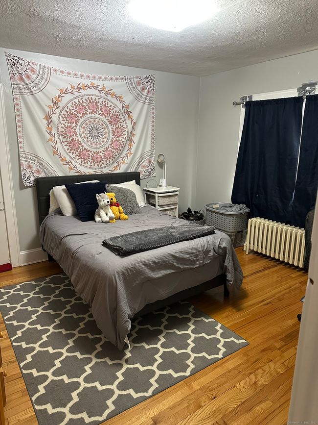 Third bedroom also with hardwood floors. Generous in size | Image 13