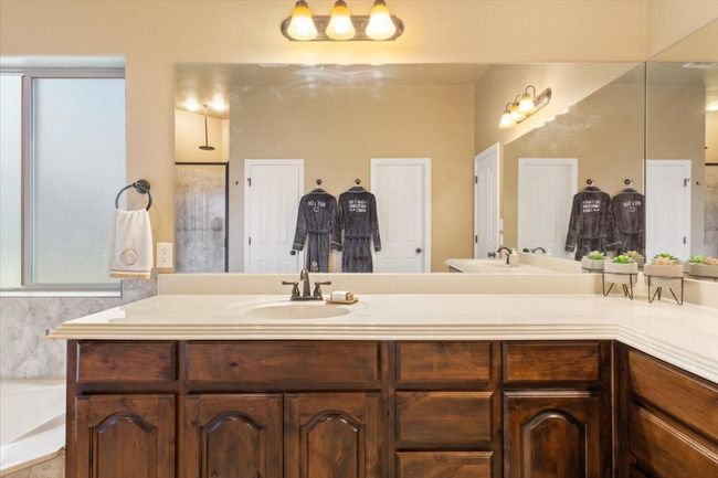 Bathroom featuring double vanity, visible vents, and a sink | Image 22