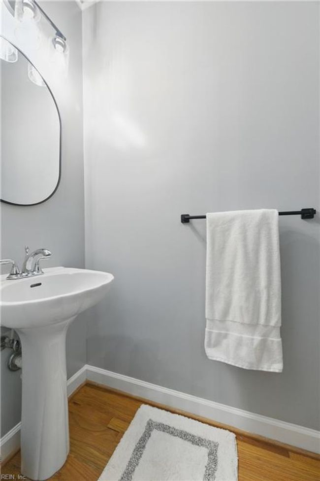 Powder Room just off the main hallway is conveniently located for guests... | Image 16