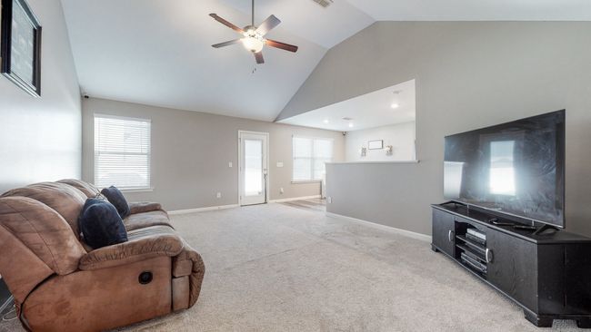 Open floor plan with natural division | Image 6