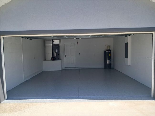 inside garage, with epoxy floor finish | Image 34