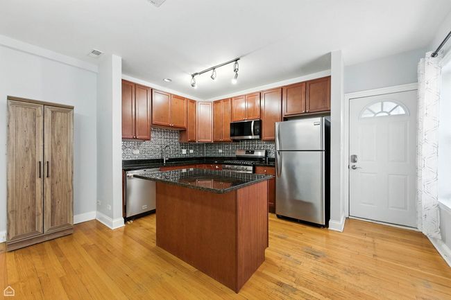 A - 2611 Rosemont Ave, Home with 3 bedrooms, 2 bathrooms and 2 parking in Chicago IL | Image 5