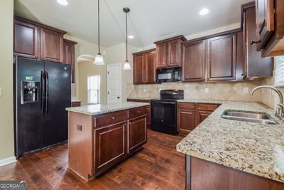 7554 Springbox Drive, House other with 4 bedrooms, 2 bathrooms and null parking in Fairburn GA | Image 2