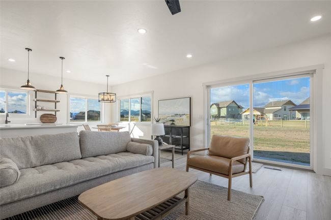 Living room featuring recessed lighting and light wood-type flooring | Image 19