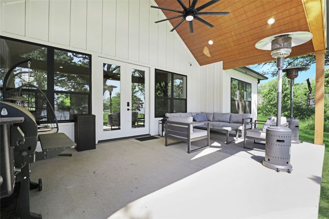 View of patio / terrace featuring ceiling fan, outdoor lounge area, and french doors | Image 35