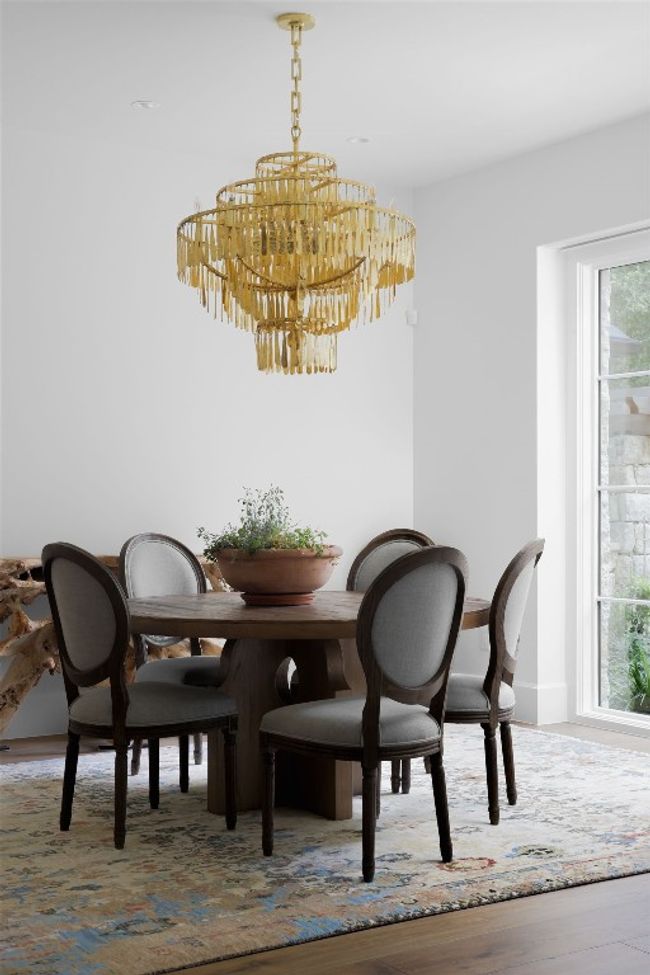 Dining room with a chandelier and wood finished floors | Image 8