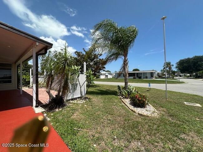 900 Oleander Cir, House other with 2 bedrooms, 2 bathrooms and null parking in Barefoot Bay FL | Image 25