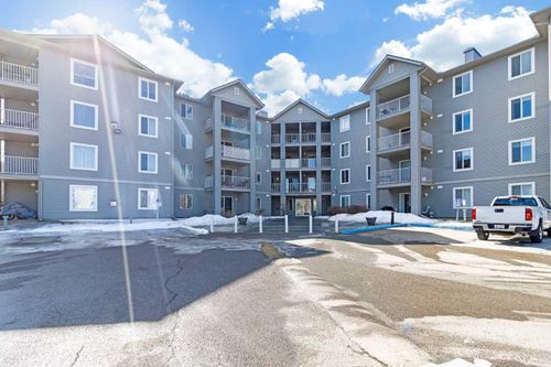 1113 - 604 8 Street Sw, Home with 2 bedrooms, 2 bathrooms and 2 parking in Airdrie AB | Card Image