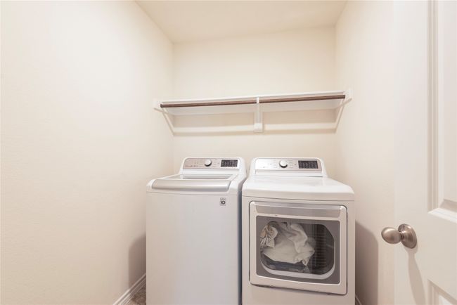 Washroom with separate washer and dryer | Image 25