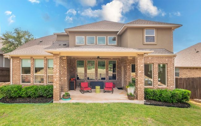 Another view of the back of the home from the backyard. | Image 28