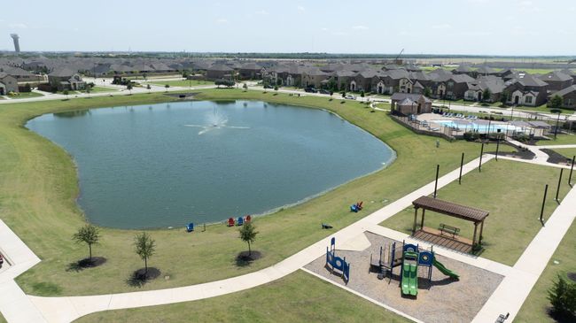 Aerial view of residential area with a large body of water | Image 35