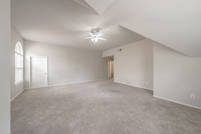 Plenty of space in the primary bedroom to create your private retreat! | Image 21